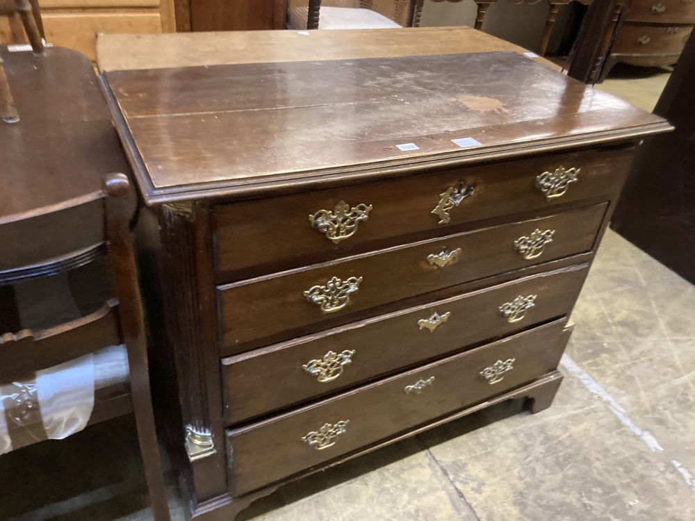 A George III oak chest of drawers, width 100cm depth 48cm height 84cm